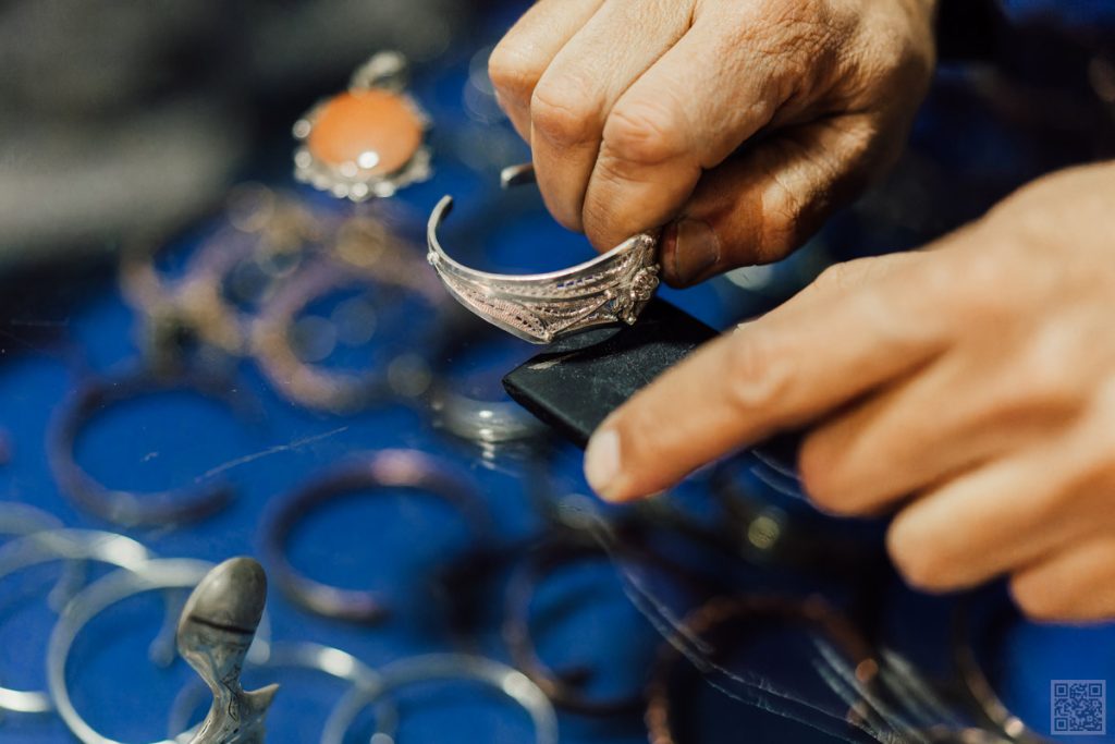 Artisan Making Silver Jewelry in Morocco