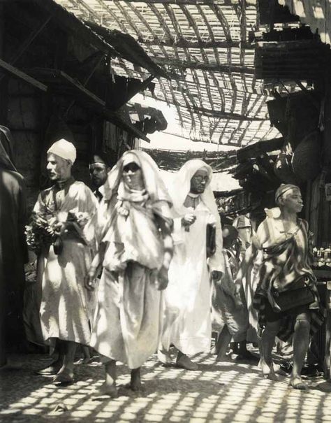 black and white old photo of a Moroccans in Medina